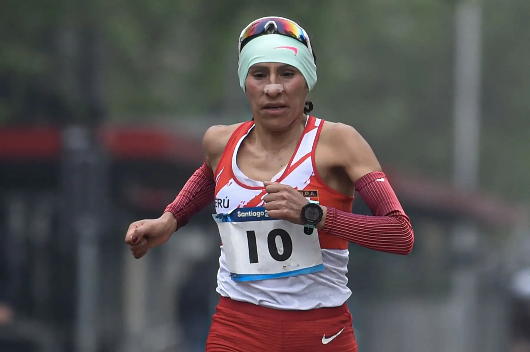 La peruana Gladys Lucy Tejeda Pucuhuaranga compite en la final del maratón femenino de los Juegos Panamericanos Santiago 2023 en Santiago.
Foto: AFP