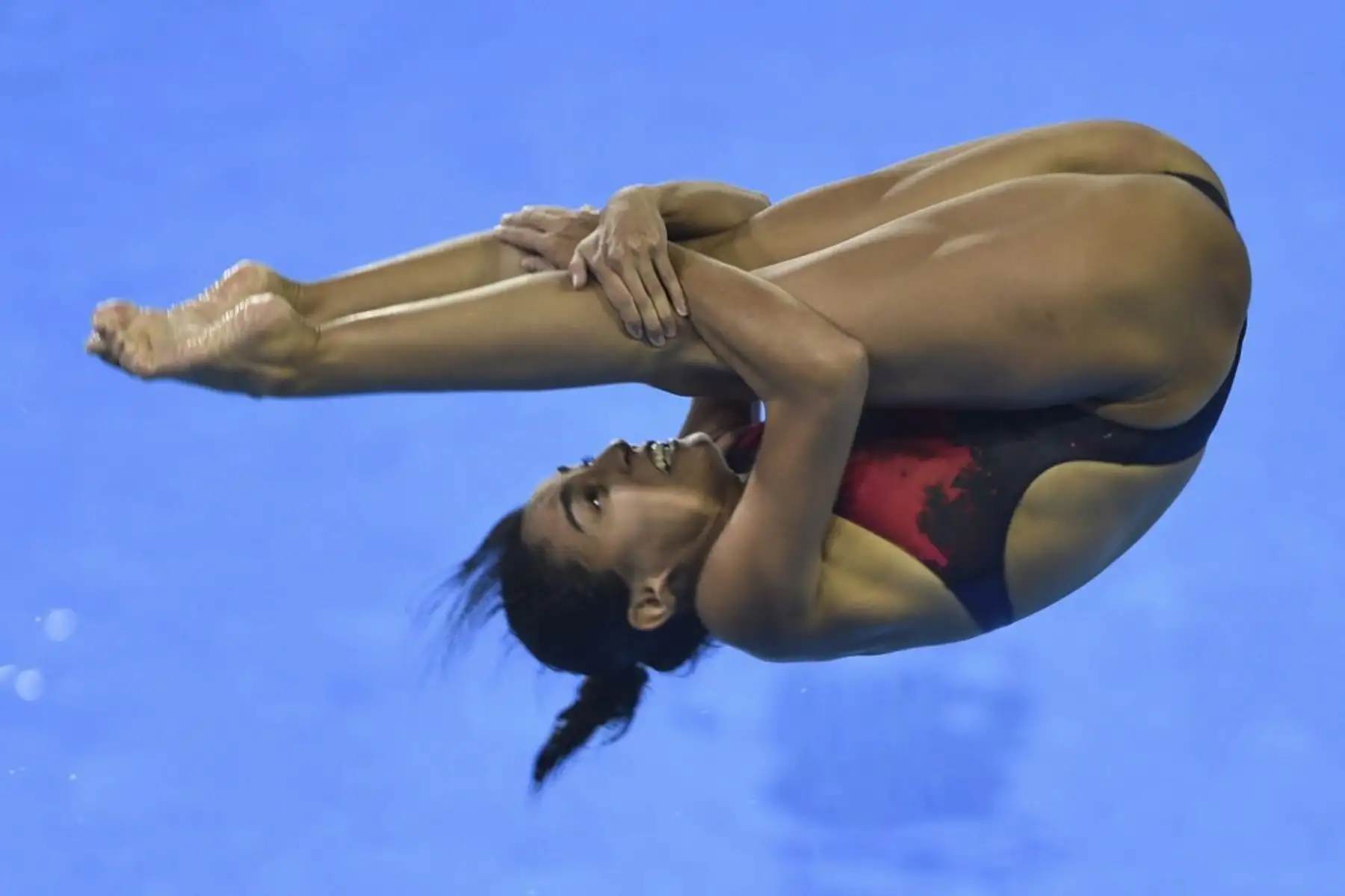 La mexicana Paola Espinosa salta en la prueba preliminar de trampolín de 1 metro femenino de los Juegos Panamericanos Lima 2019, el 2 de agosto de 2019. Foto: AFP