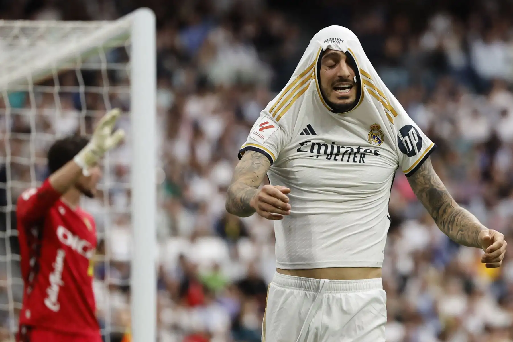 El delantero español del Real Madrid Joselu reacciona al perder una oportunidad de gol durante el partido de fútbol de la liga española entre el Real Madrid CF y el Cádiz CF.
Foto: ANDINA/AFP