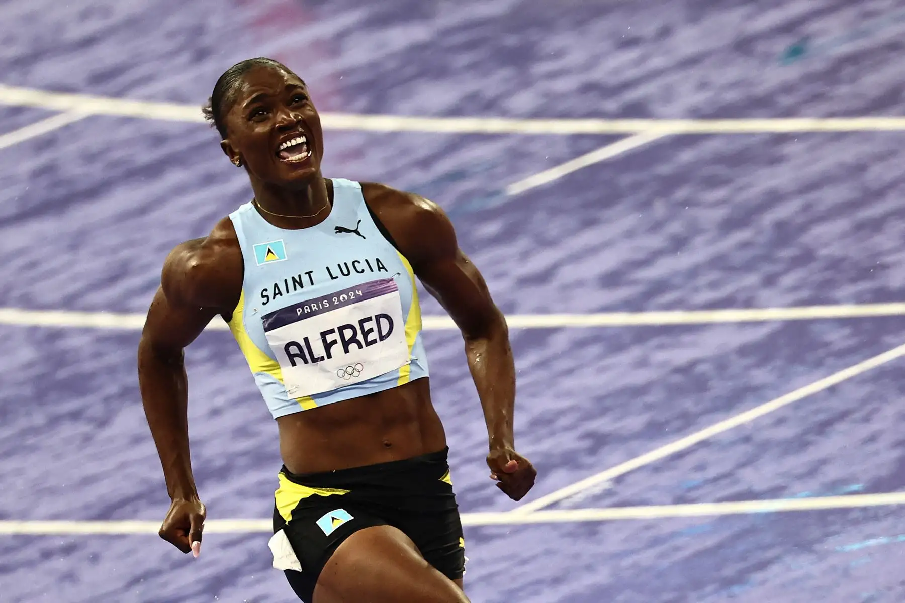 Julien Alfred, de Santa Lucía, celebra ganar la final femenina de 100 metros de la prueba de atletismo de los Juegos Olímpicos de París 2024.
Foto: AFP
