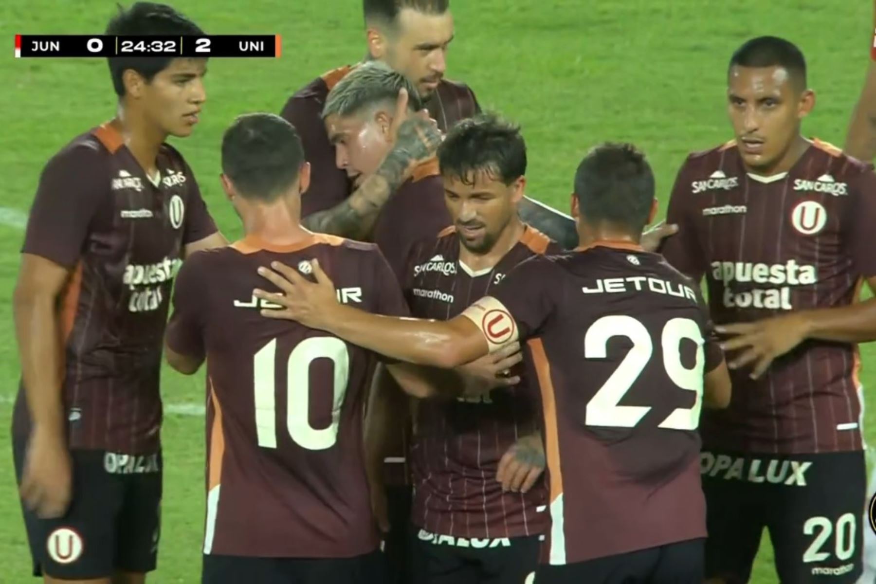 Universitario juega en Colombia contra el Junior de Barranquilla. Imagen: Captura de pantalla.