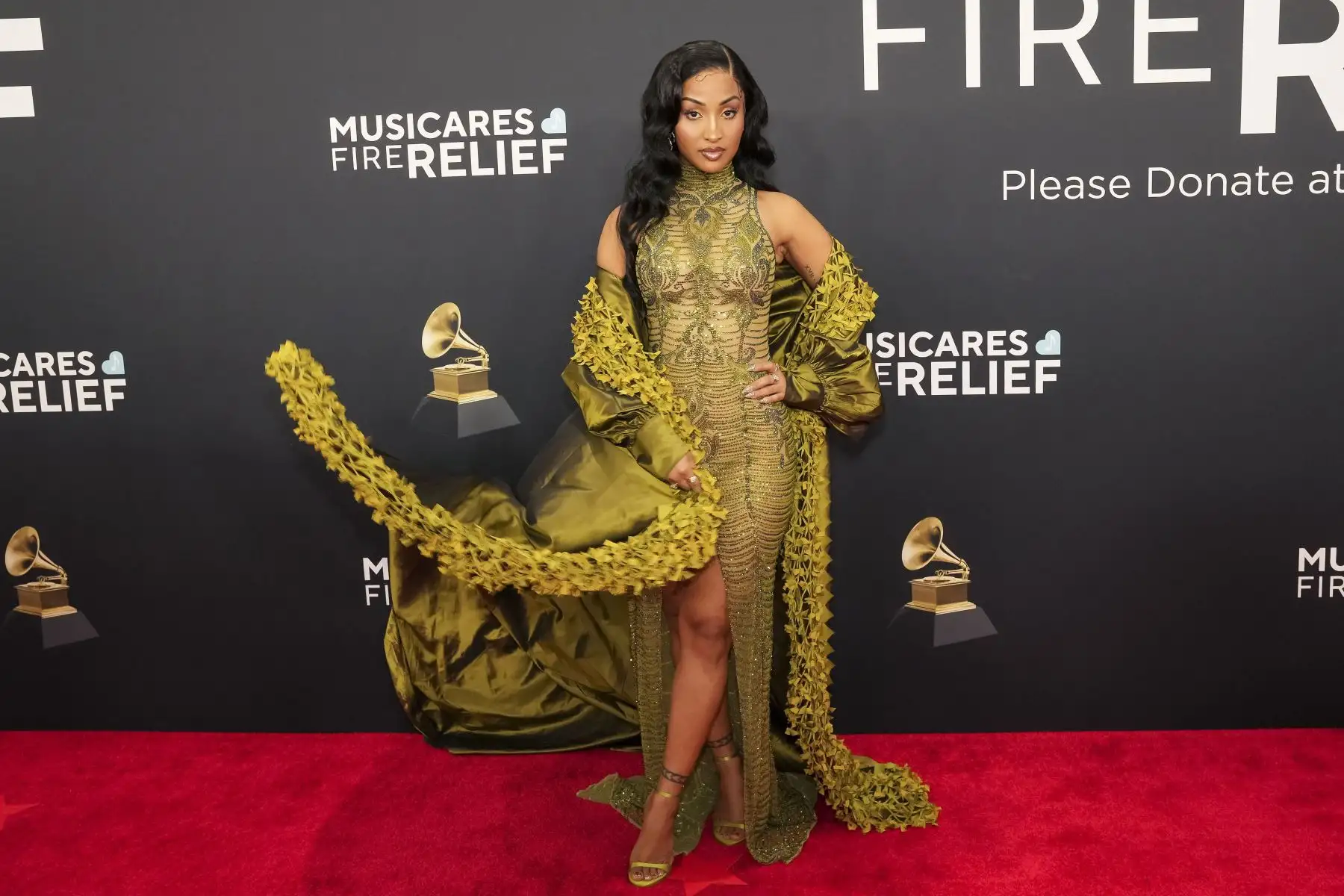 La músico jamaicana Shenseea, también conocida como Chinsea Linda Lee, en la alfombra roja de la 67ª ceremonia anual de los premios Grammy en el Crypto.com Arena de Los Ángeles.
Foto: EFE