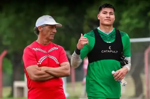 Diego Romero junto a Pedro Troglio