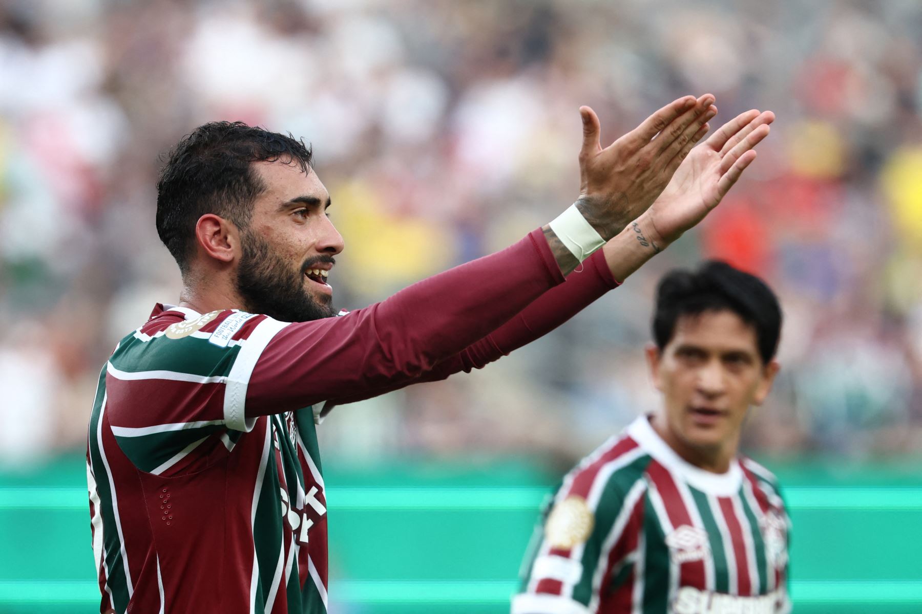 El defensor argentino del Fluminense, Juan Pablo Freytes, celebra después de marcar el tercer gol de su equipo durante el partido de fútbol del Grupo F de la Copa Mundial de Clubes de la FIFA 2025 entre el Fluminense de Brasil y el Ulsan HD de Corea del Sur en el estadio MetLife en East Rutherford, Nueva Jersey.
Foto: AFP