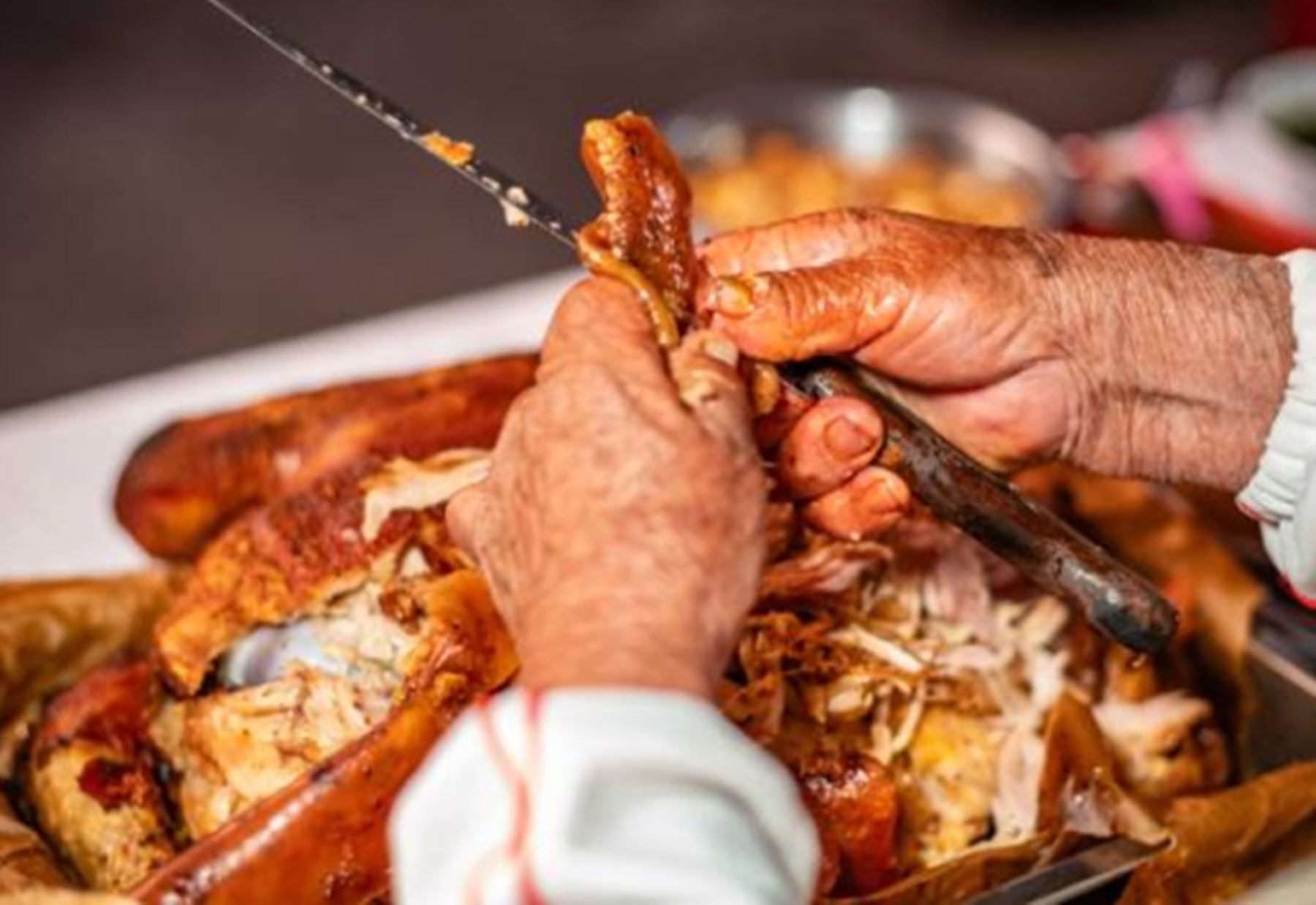 Olga Plácido, usuaria de Pensión 65 y baluarte de la receta del tradicional y emblemático lechón al horno en el distrito de Orcotuna, provincia de Concepción y departamento de Junín.