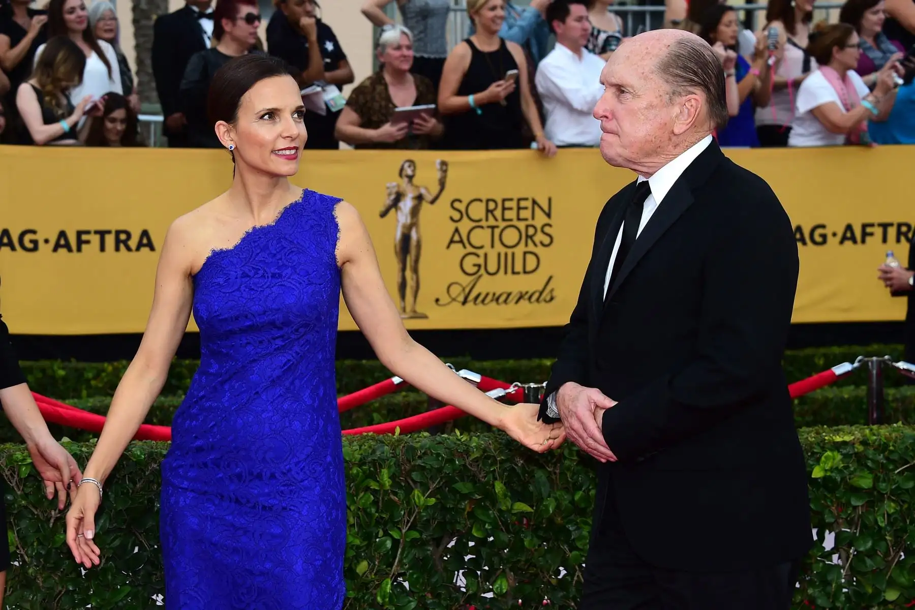 Robert Duvall  y Luciana Duvall llegan a la 21.ª edición de los Premios del Sindicato de Actores de Cine, el 25 de enero de 2015, en el Auditorio Shrine de Los Ángeles, California. 
Foto: AFP