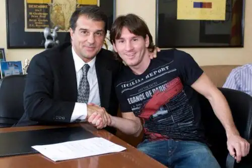 Joan Laporta junto a Lionel Messi