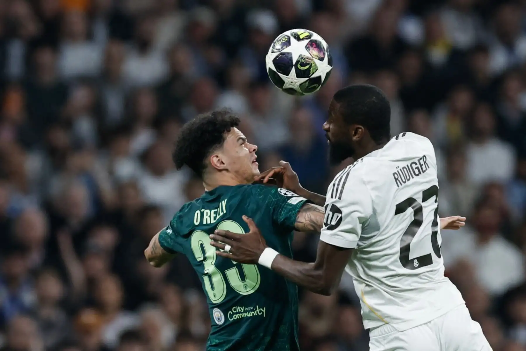 El defensa alemán  del Real Madrid, Antonio Ruediger  y el centrocampista inglés  del Manchester City, Nico O