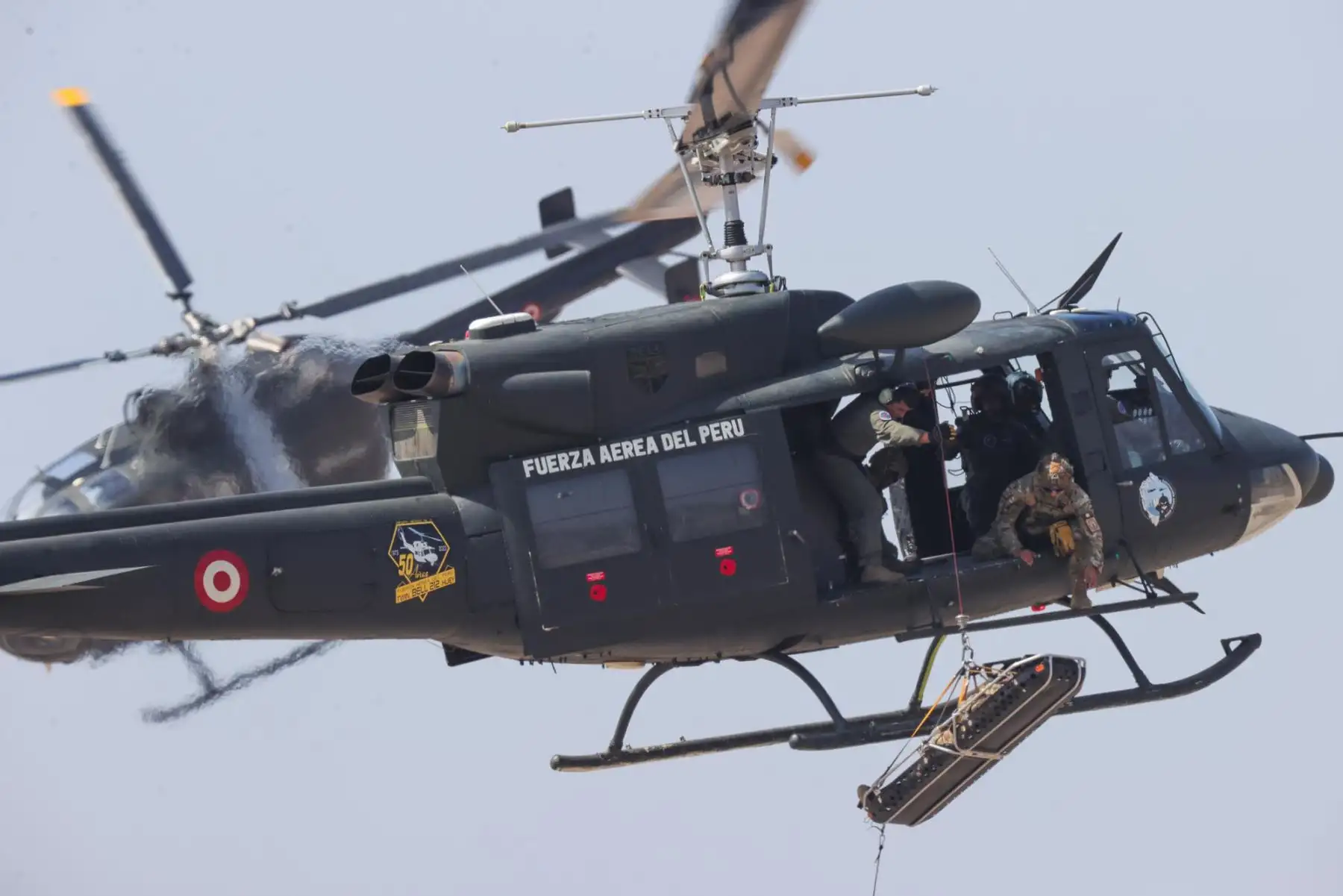 1.	
Helicópteros de la Fuerza Aérea del Perú realizan maniobras de rescate aéreo durante el XVIII Festival Aéreo BALP 2026.  Foto: ANDINA / Carlos Américo Lezama Villantoy