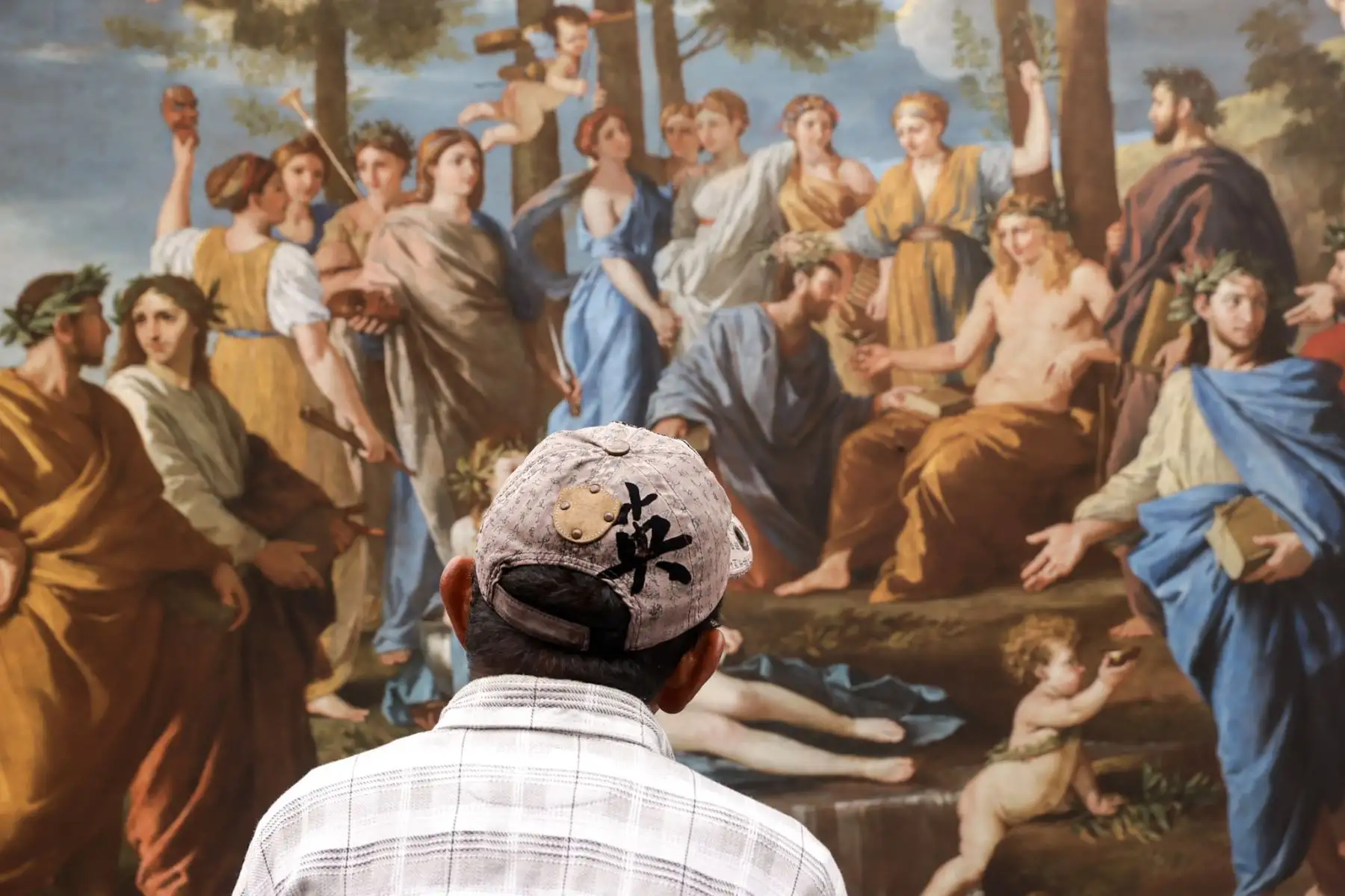 Un visitante contempla una reproducción de “La rendición de Breda”, célebre obra de Diego Velázquez que retrata la entrega de las llaves de la ciudad holandesa tras el asedio español de 1625. La pintura es considerada una de las grandes composiciones históricas del barroco europeo. Foto: ANDINA/Luis Iparraguirre.