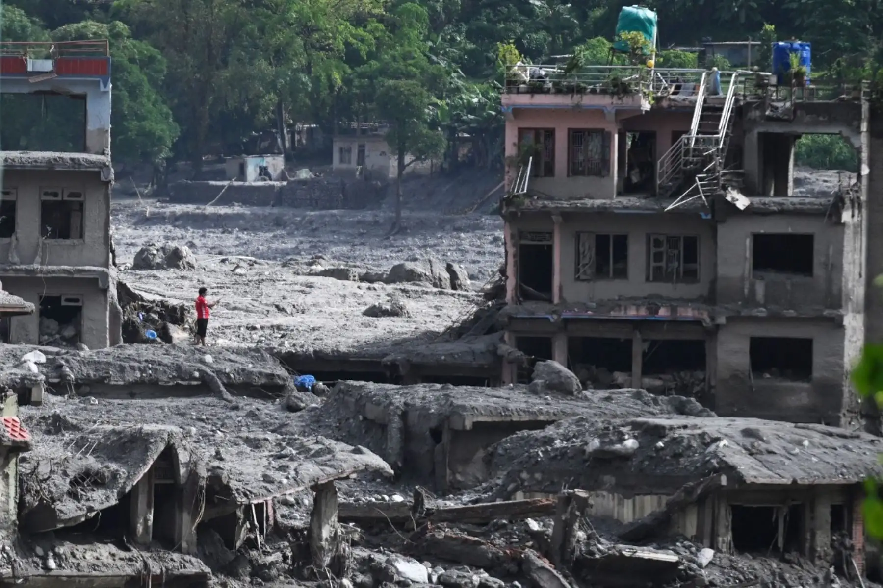 Casi 4.500 personas siguen desaparecidas en Nepal y en la región autónoma china del Tíbet, seis días después del gigantesco alud que arrasó la región tras el derrumbe de un glaciar. Foto: AFP