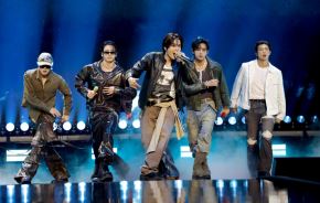  DE IZQ. A DER.) j-hope, Jung Kook, SUGA, V y RM de BTS actúan sobre el escenario durante el iHeartRadio Music Festival 2026 en el T-Mobile Arena el 18 de setiembre de 2026 en Las Vegas, Nevada. Foto: AFP